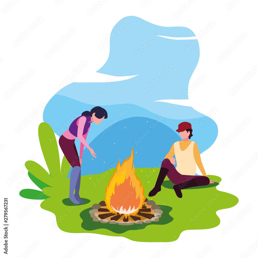 man and woman with bonfire camping hiking landscape man and woman with bonfire camping hiking landscape