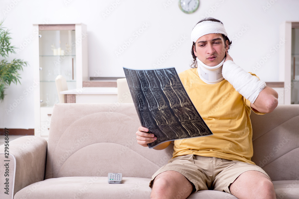 Young man after accident recovering at home Young man after accident recovering at home