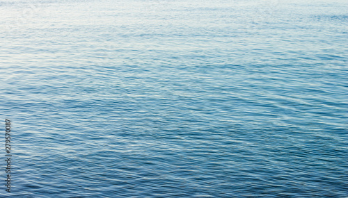 calm and peaceful blue water perspective surface natural background, copy space 