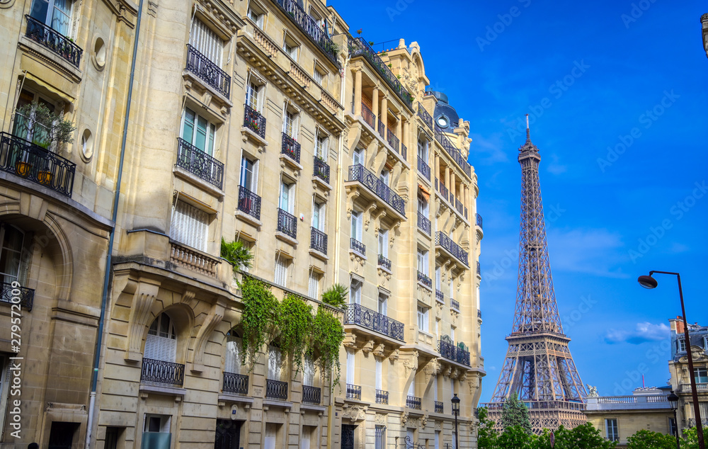 A view of the Eiffel Tower from the streets of Paris, France. A view of the Eiffel Tower from the streets of Paris, France.