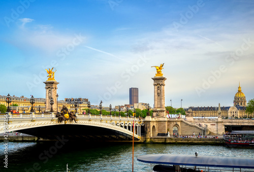 A view of the Pont Alexandre III bridge that spans the Seine River in Paris, France © Jbyard