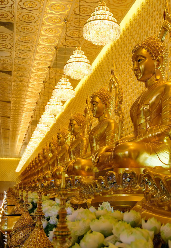 Many buddha statues in the temple