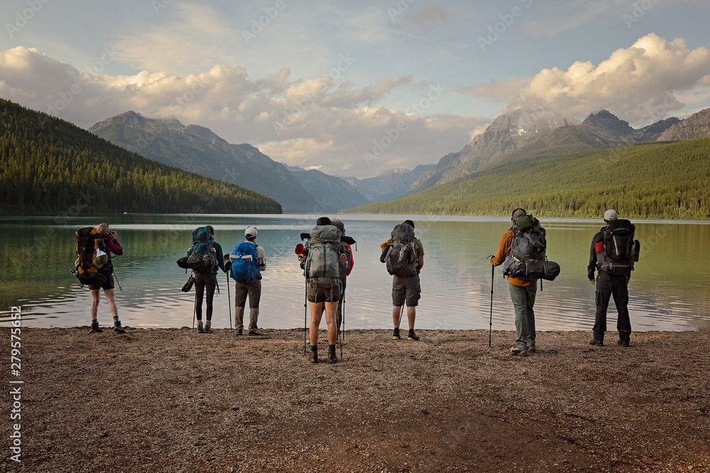 group of hikers ready to hike around Bowman lake in Montana, Glacier National Park