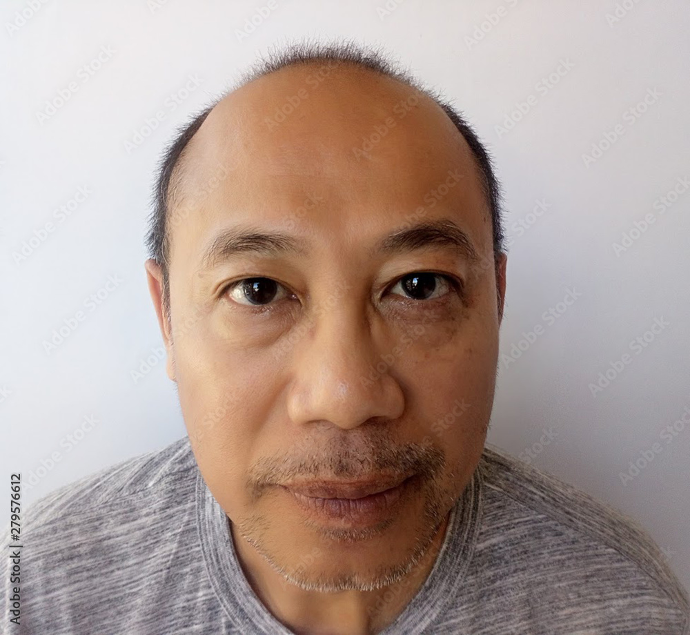Obraz premium Middle-aged man with a round face, little hair, bald,broad forehead ... Hair and beard began to have white ... White background