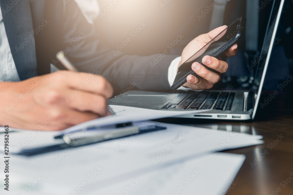 Business process photo. Account manager using mobile phone. Typing contemporary smartphone screen Business process photo. Account manager using mobile phone. Typing contemporary smartphone screen
