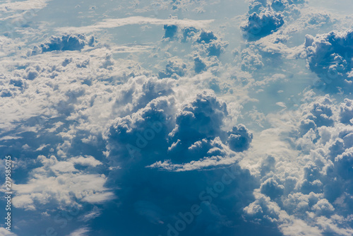 Blue sky with cloud above view from airplane