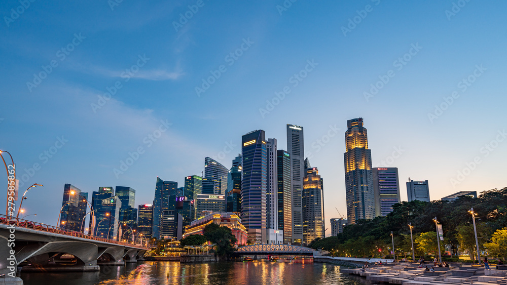 The Central Business District and Marina Bay skyline at dusk in Singapore The Central Business District and Marina Bay skyline at dusk in Singapore