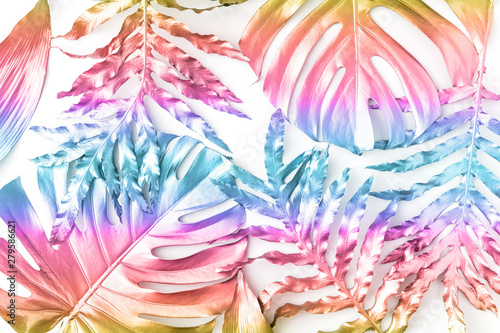 Flat lay of golden tropical leaf design elements. Decoration elements for inv...