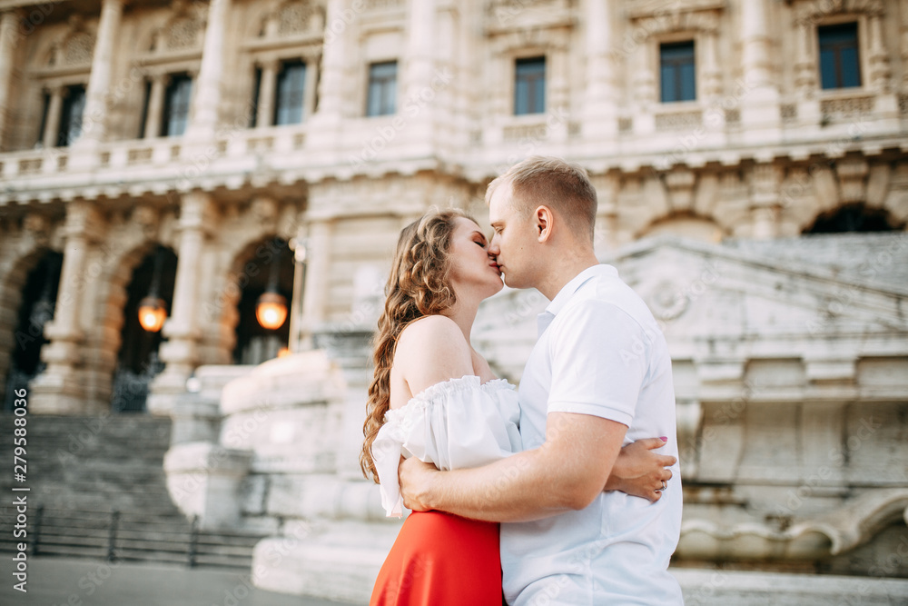 Stylish loving couple walking and laughing. Wedding shooting on the streets of Rome, Italy. Stylish loving couple walking and laughing. Wedding shooting on the streets of Rome, Italy.