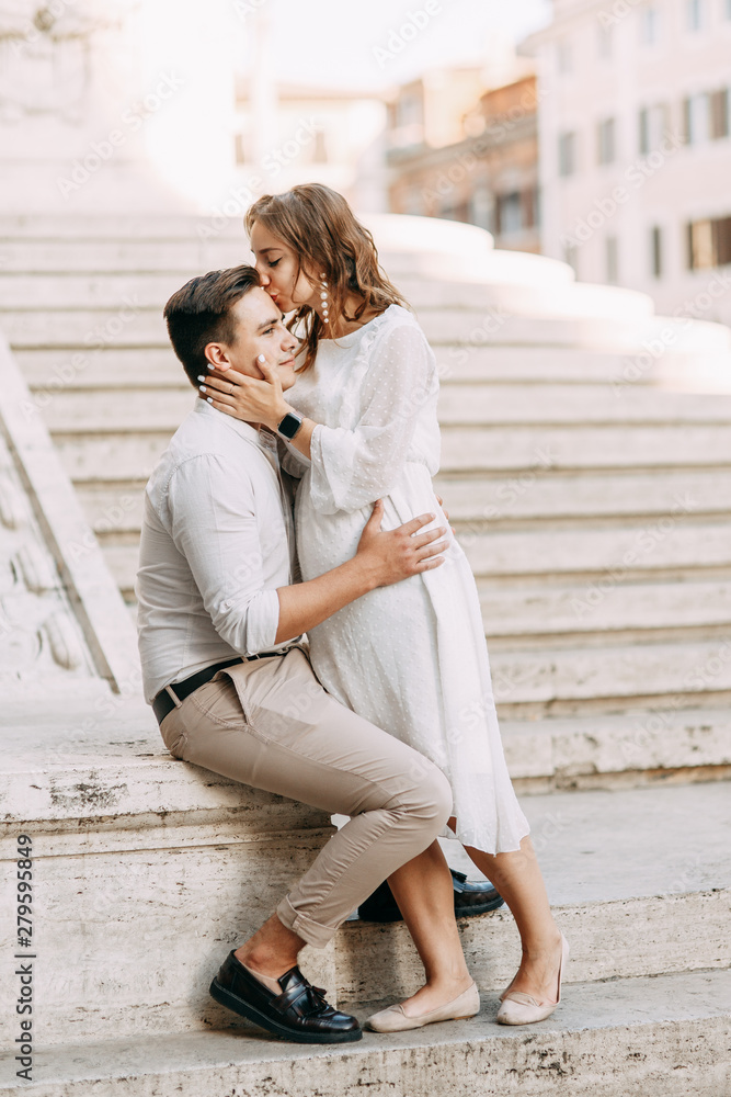 Beautiful stylish pair of in the European style. Wedding photo shoot on the streets of Rome. Beautiful stylish pair of in the European style. Wedding photo shoot on the streets of Rome.