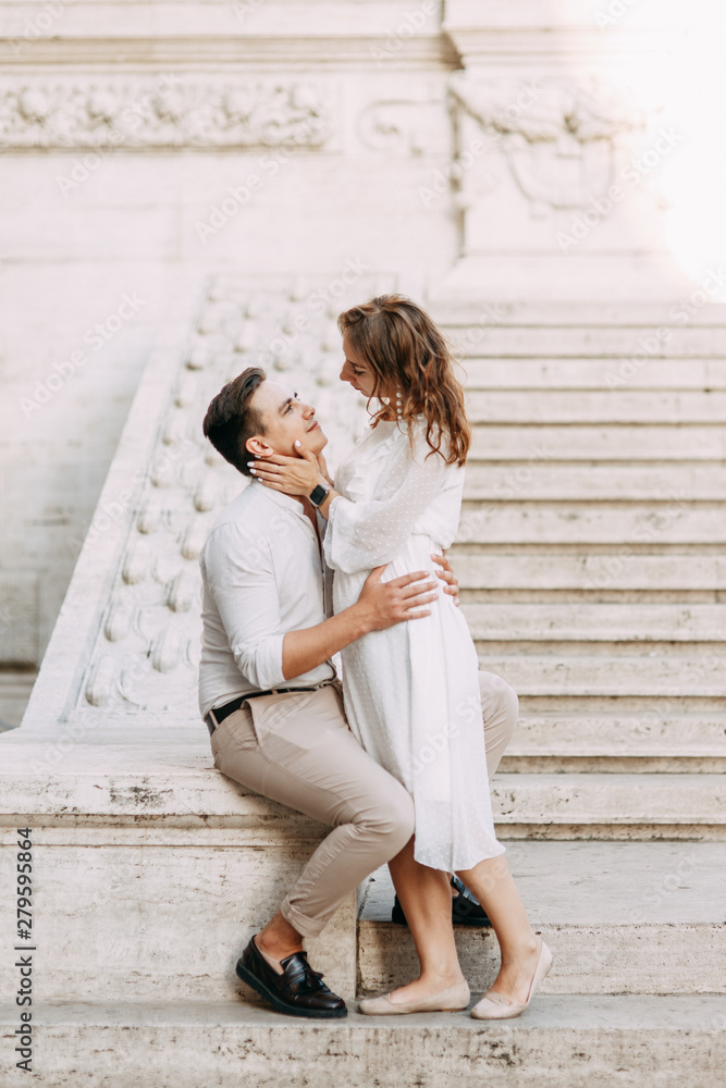 Beautiful stylish pair of in the European style. Wedding photo shoot on the streets of Rome. Beautiful stylish pair of in the European style. Wedding photo shoot on the streets of Rome.