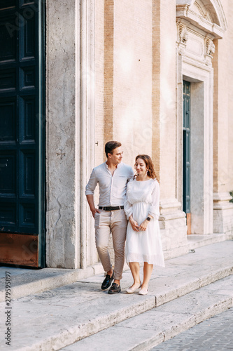  Beautiful stylish pair of in the European style. Wedding photo shoot on the streets of Rome. © pavelvozmischev