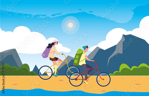couple riding bike in the landscape