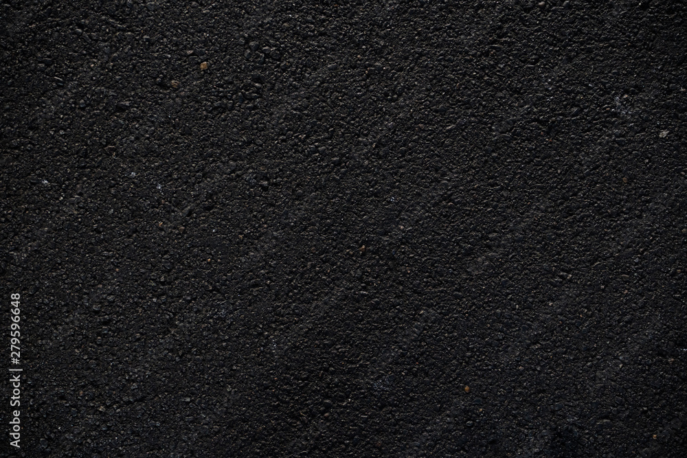 Fototapeta premium Dark asphalt texture background graphic asset.
