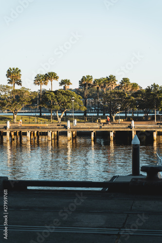 Early morning sun lights Darling Island at Pirrama Park Jones Bay Wharf  Sydney NSW.