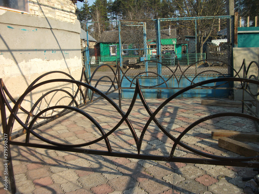metal fence in the cemetery outdoor day metal fence in the cemetery outdoor day