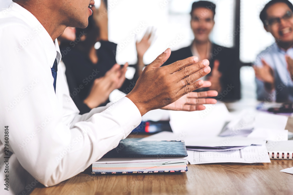 Business people clapping hands in the meeting.Partnership approval and thanks gesture concept Business people clapping hands in the meeting.Partnership approval and thanks gesture concept