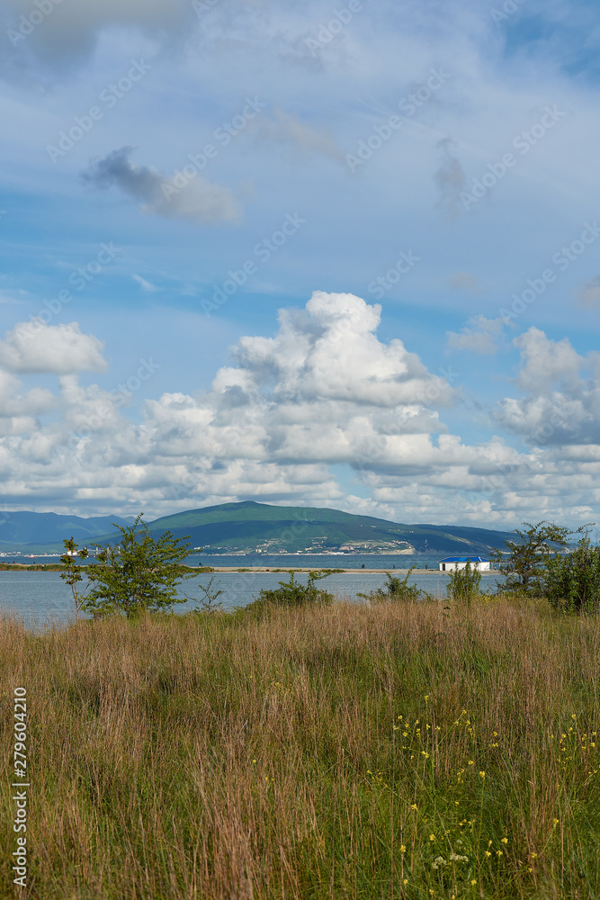 landscape with lake and blue sky