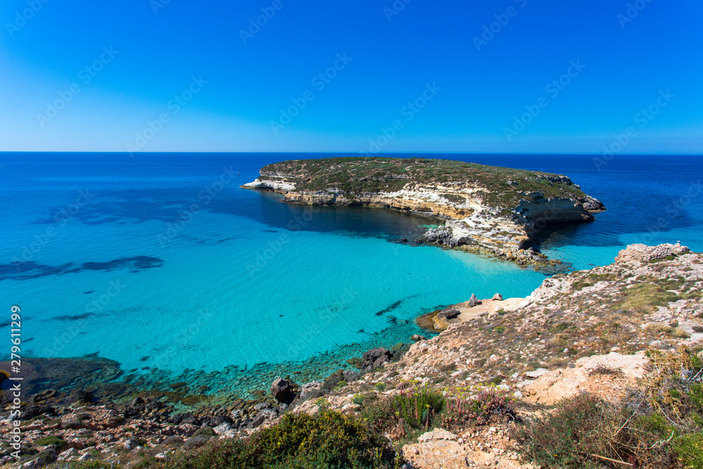 Lampedusa Island Sicily - Rabbit Beach and Rabbit Island  Lampedusa “Spiaggia dei Conigli” with turquoise water and white sand at paradise beach.