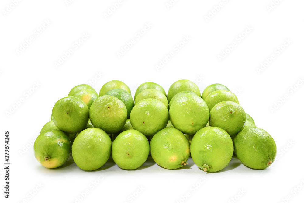 Many fresh limes on white background. Many fresh limes on white background.