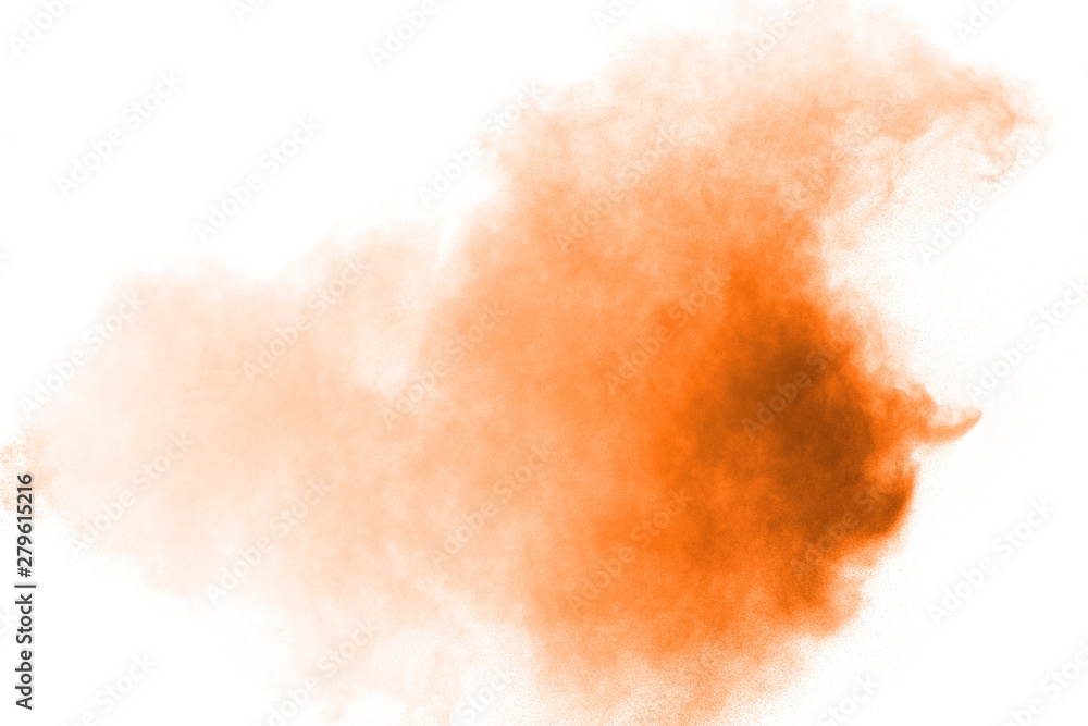 Abstract orange powder explosion on white background. Freeze motion of orange dust particles splash. Abstract orange powder explosion on white background. Freeze motion of orange dust particles splash.