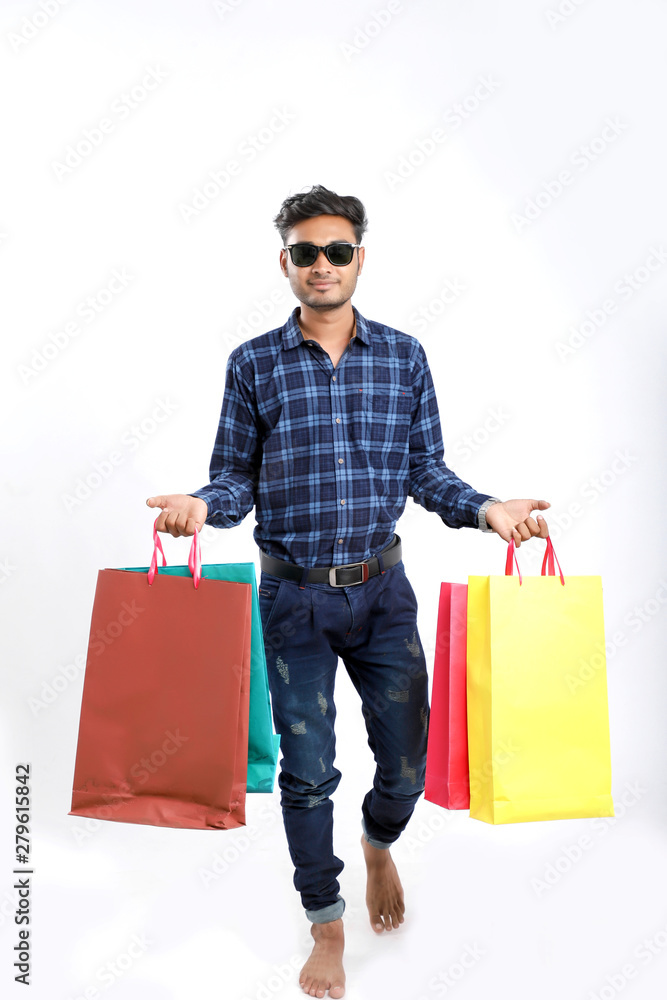 young indian man with shopping bags, Indian festival young indian man with shopping bags, Indian festival