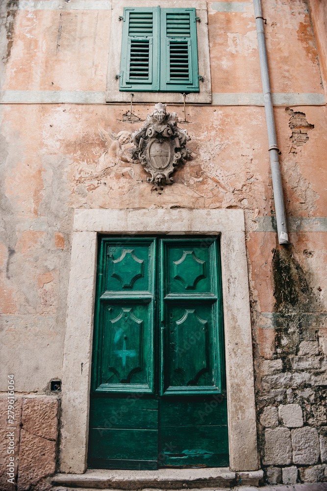 stucco ornament with knight armor above the door stucco ornament with knight armor above the door