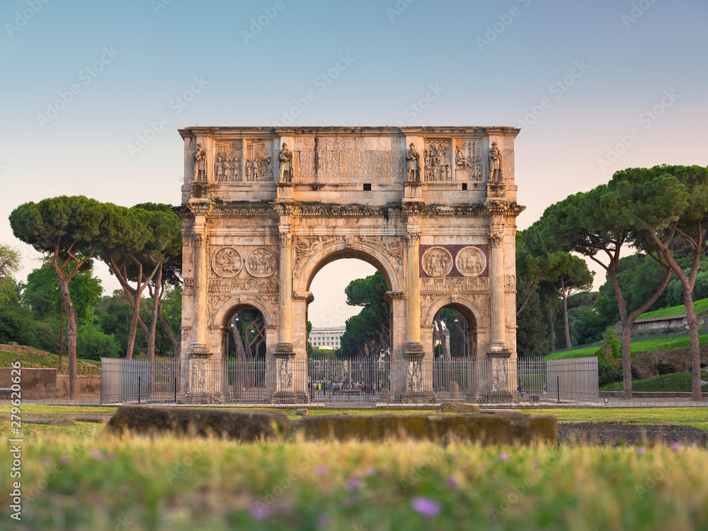 wide angle view to triumph arch of Titus in Rome in Italy in summer evening