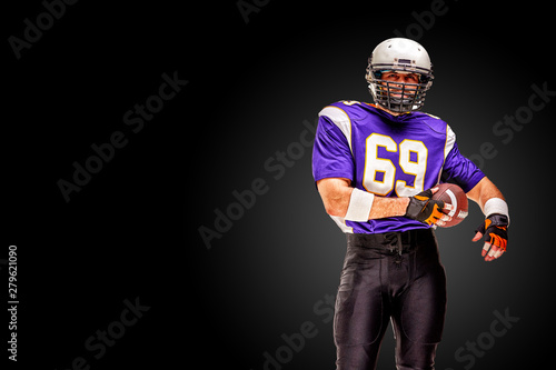 Concept american football, portrait of american football player in helmet with patriotic look. Black white background, copy space. sport banner
