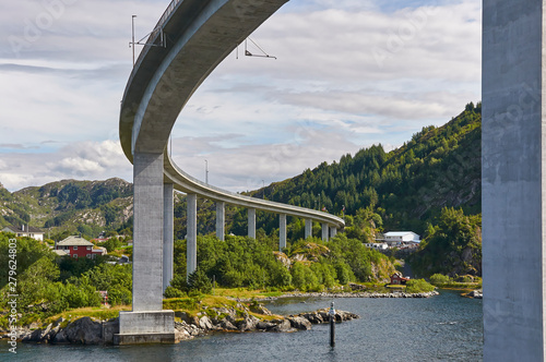 On a Vessel passing under the Maloy Road Bridge which connects the Islands of Maloya and Vagsoy on the Western Coast of Norway, near Bergen. photo
