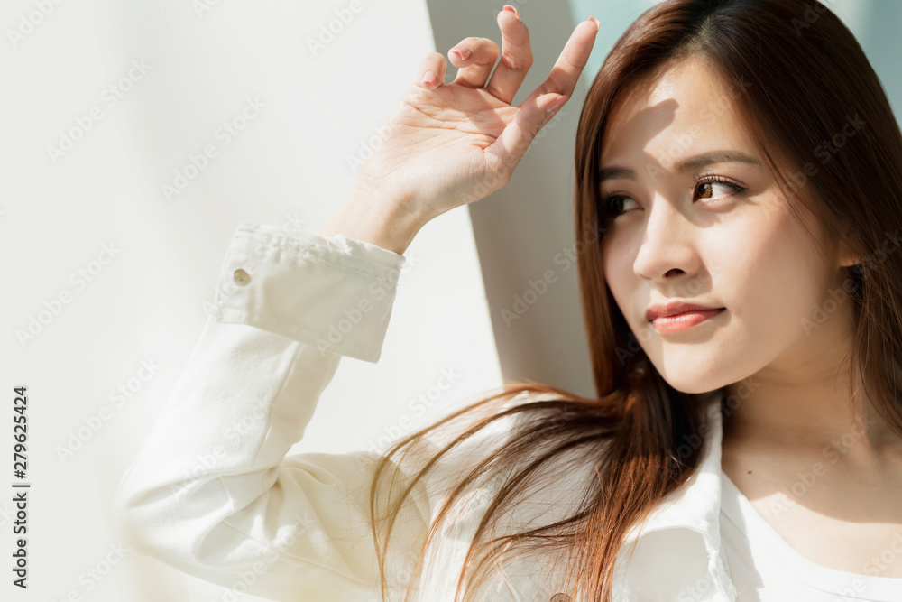asian beautiful woman with brown long hair portrait white costume smile happiness and confident vacation concept asian beautiful woman with brown long hair portrait white costume smile happiness and confident vacation concept