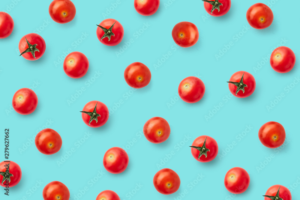 Cherry tomatoes on colored background. Pattern of cherry tomatoes. Vegans concept. Composition of tomatoes Cherry tomatoes on colored background. Pattern of cherry tomatoes. Vegans concept. Composition of tomatoes