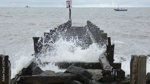 Waves Crashing through an Old Pier 4