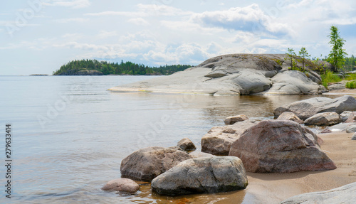 Islands in Lake Ladoga. Beautiful landscape - water, pines and boulders. photo