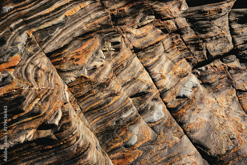 Interesting striated rock texture background Interesting striated rock texture background