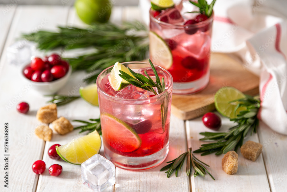 Cold season drink - cranberry and rosemary cocktail, copy space Cold season drink - cranberry and rosemary cocktail, copy space