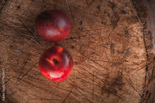 ripe sweet nectarine on a wooden background