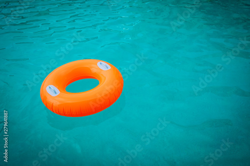 kids floatie in the pool, water safety and summer fun photo