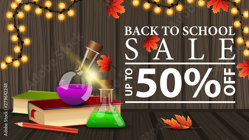 Back to school sale, discount web banner with wooden texture, books and chemical flasks
