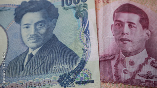 Wallpaper Mural Thai and Japanese money Put together . Concept Digital financial business together between Thailand and Japan. Torontodigital.ca