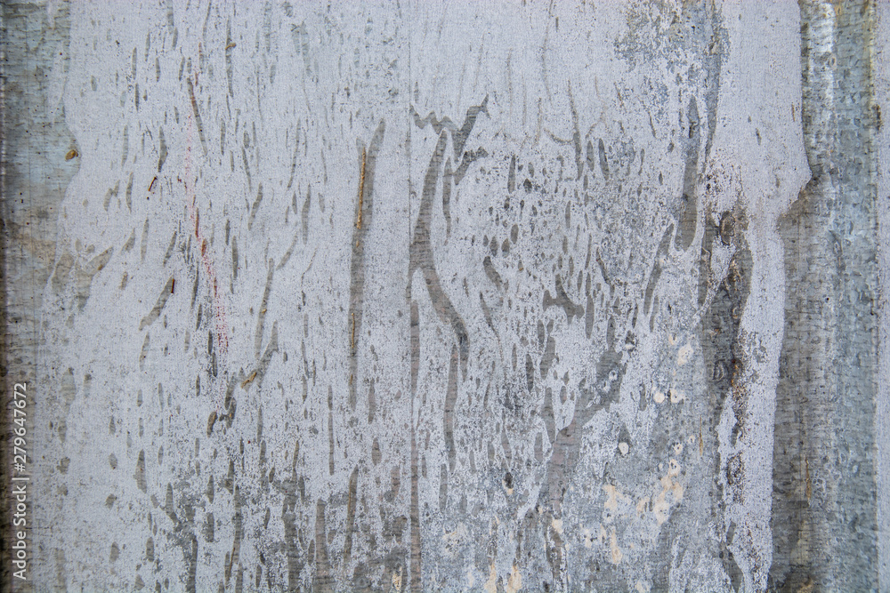 Metal fence covered in paper and glue with interesting texture Metal fence covered in paper and glue with interesting texture