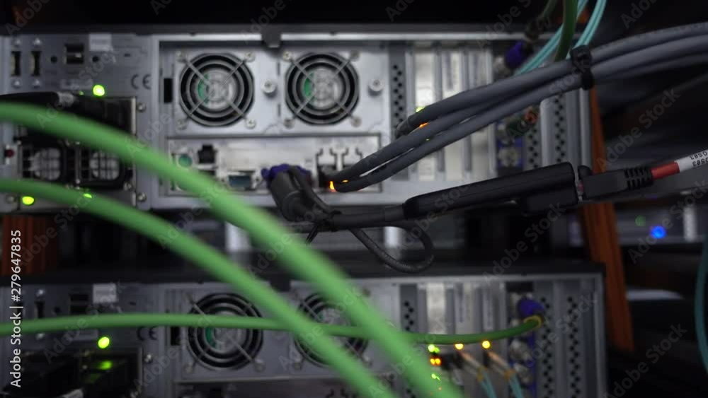 Blinking network ethernet switch with connected cables in server room. Blinking network ethernet switch with connected cables in server room.