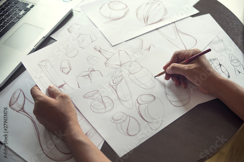 Production designer sketching Drawing Development Design product packaging prototype idea Creative Concept photo