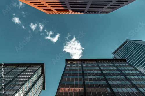 modern office apartment building blue sky and clouds