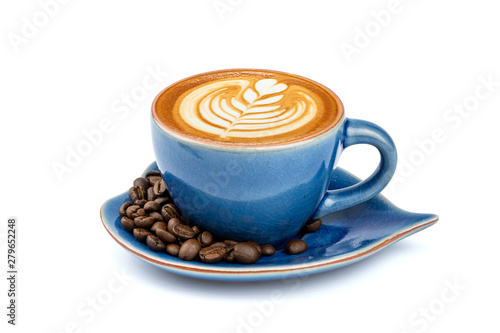 Side view of hot latte coffee with latte art in a ceramic blue cup and saucer isolated on white background with clipping path inside.