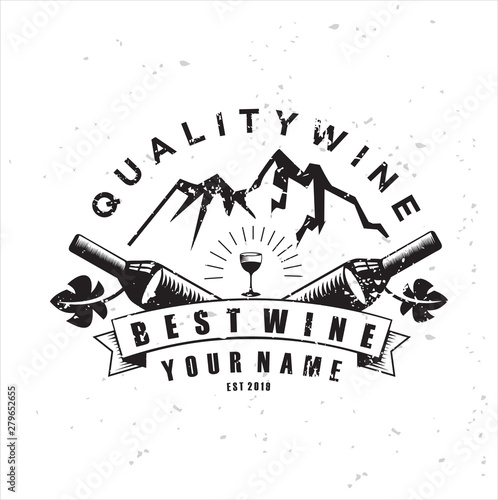 Mountain vintage style wine theme logo. Elegant logotype template Emblem for wine, restaurant menu, winery branding. Wine logo with a vintage mountain theme using grunge effects.