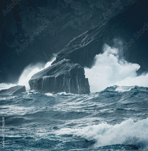 Azores, Big waves crashing over black volcanic rock on the Atlantic Ocean in the coast of Sao Miguel island in the Azores, Portugal