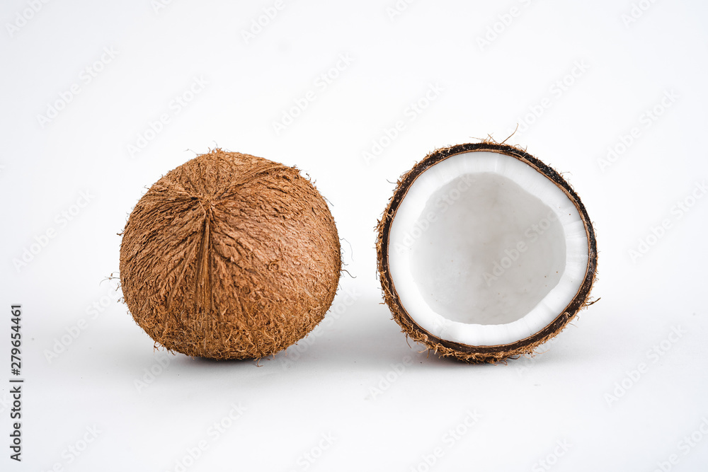 Close-Up Of Coconut Against White Background Close-Up Of Coconut Against White Background