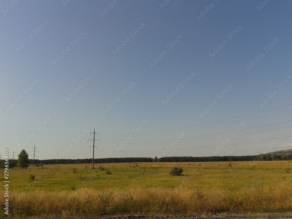 rural landscape with wheat field and blue sky rural landscape with wheat field and blue sky
