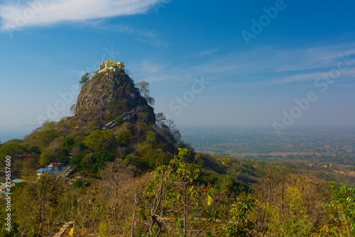 Mount Popa is an extinct volcano on the slopes of which can be found the sacred Popa Taungkalat monastery, perched dramatically atop a huge rocky outcrop.